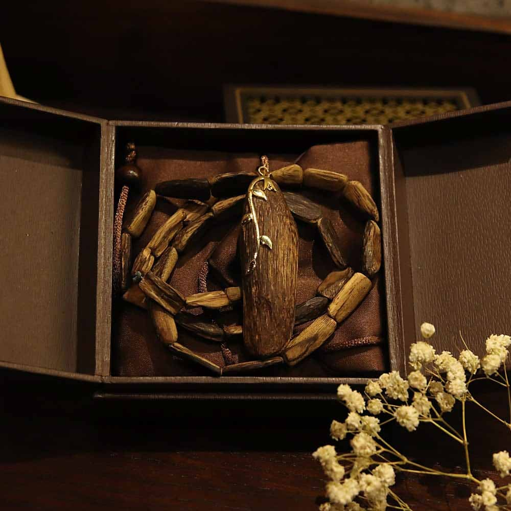 Vòng trầm hương đốt trúc - Charm rồng bạc Ý